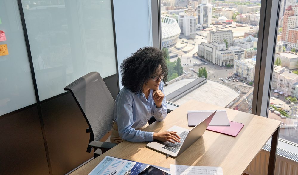 Woman working on laptop in office